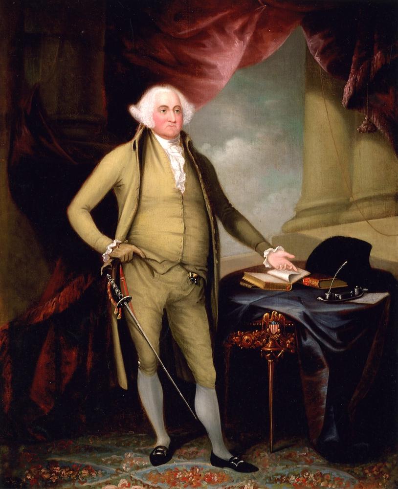 A portrait of John Adams in olive green suit with ceremonial sword, standing at desk and pointing to open book.  On exhibit at Adams National Historical Park.